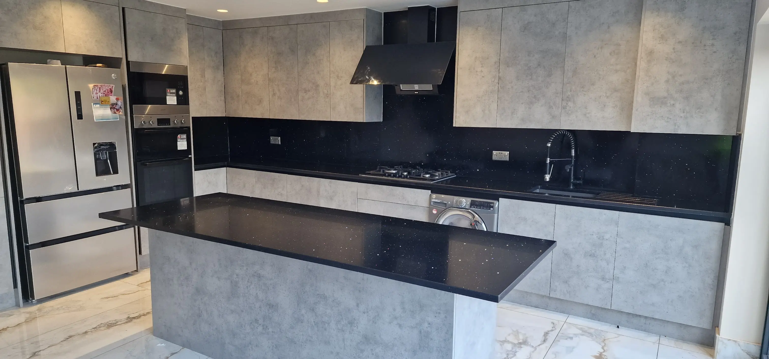 Black Quartz Worktops Chiswick Black quartz worktops in a contemporary Chiswick kitchen