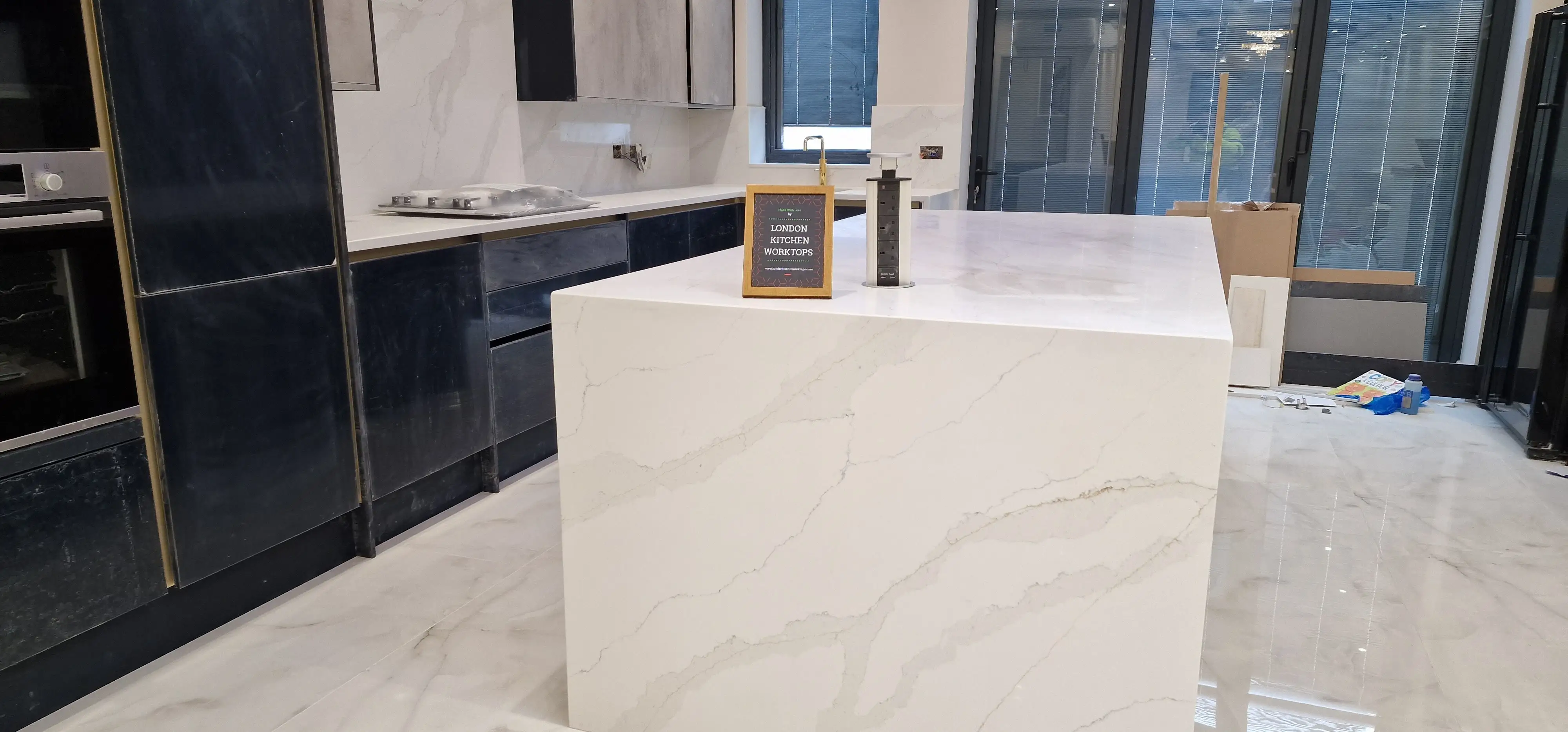 Calacatta Quartz Chiswick Calacatta quartz island worktop fitted in a Chiswick kitchen
