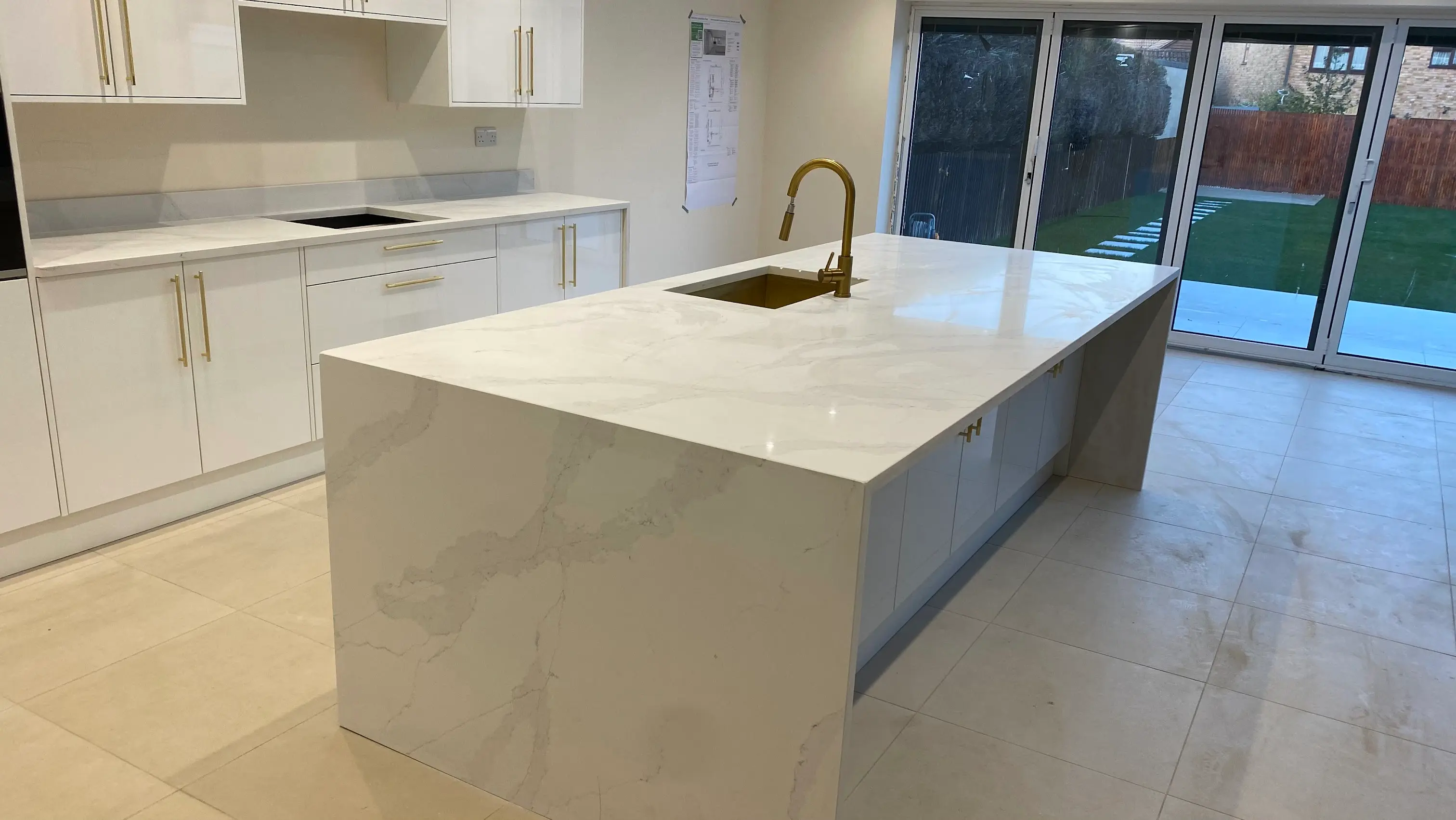Calacatta quartz kitchen island and worktops in a Greenford kitchen