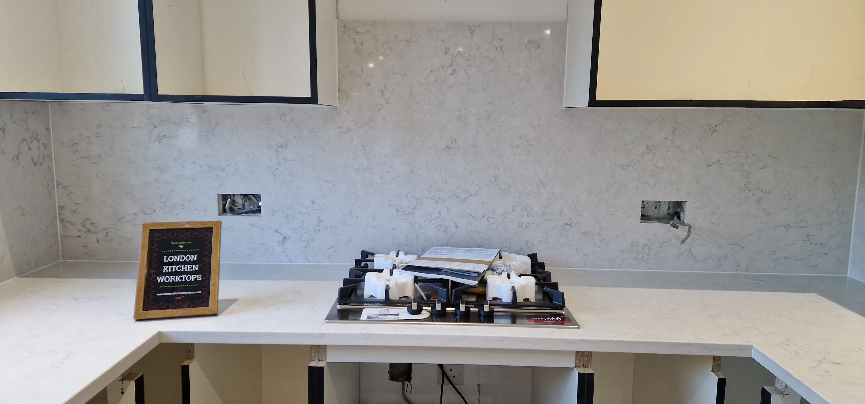 Carrara style quartz worktop with soft grey veining in Greenford