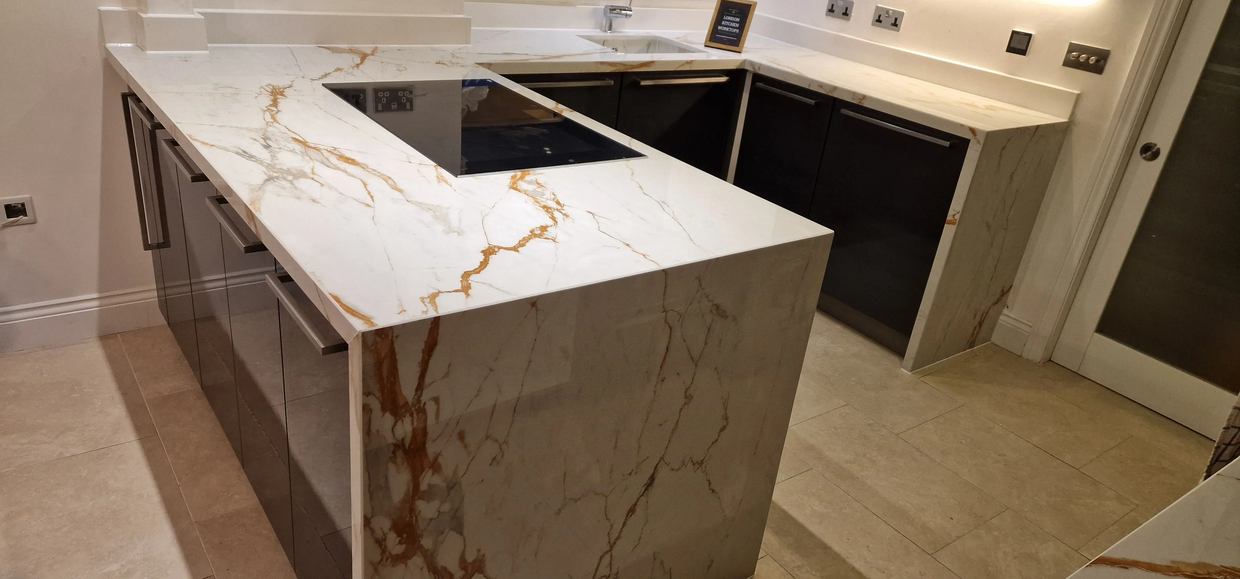 Dekton waterfall island installed in a luxury kitchen near Ealing