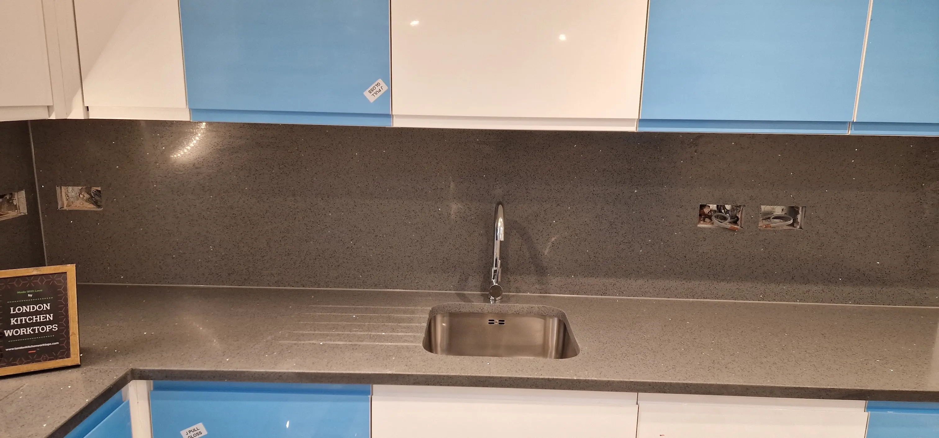 Grey Quartz Worktops Chelsea Mansion Flat Grey quartz worktops fitted in a Chelsea mansion flat kitchen