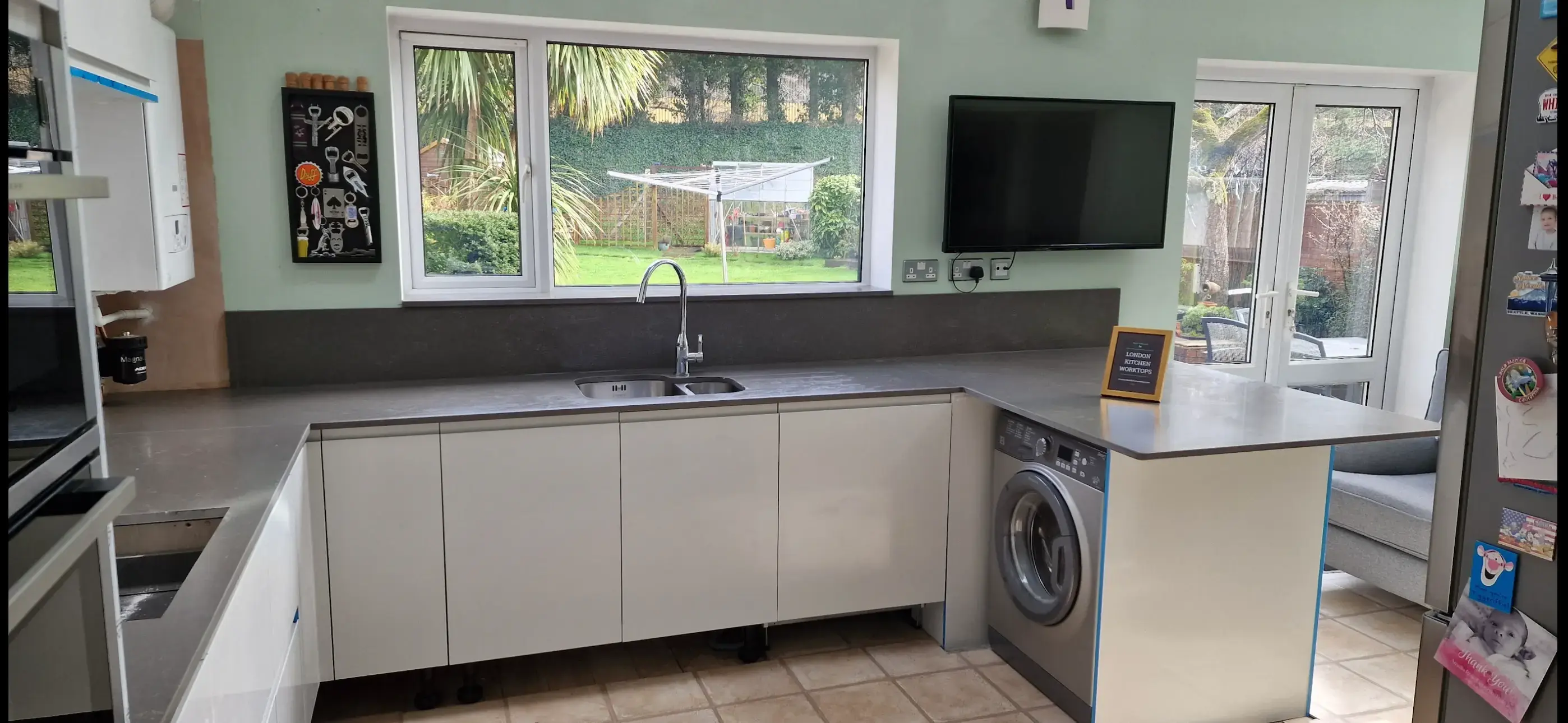 Grey Quartz Worktops Southall Grey quartz worktops fitted in a Southall family kitchen