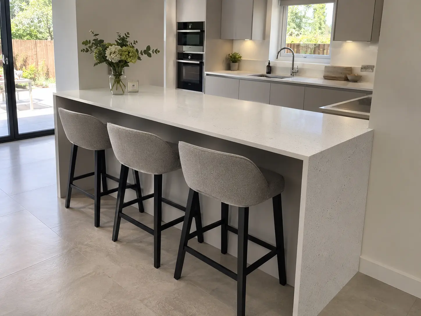 Quartz breakfast bar Long Ditton Quartz breakfast bar peninsula fitted in a Long Ditton kitchen extension
