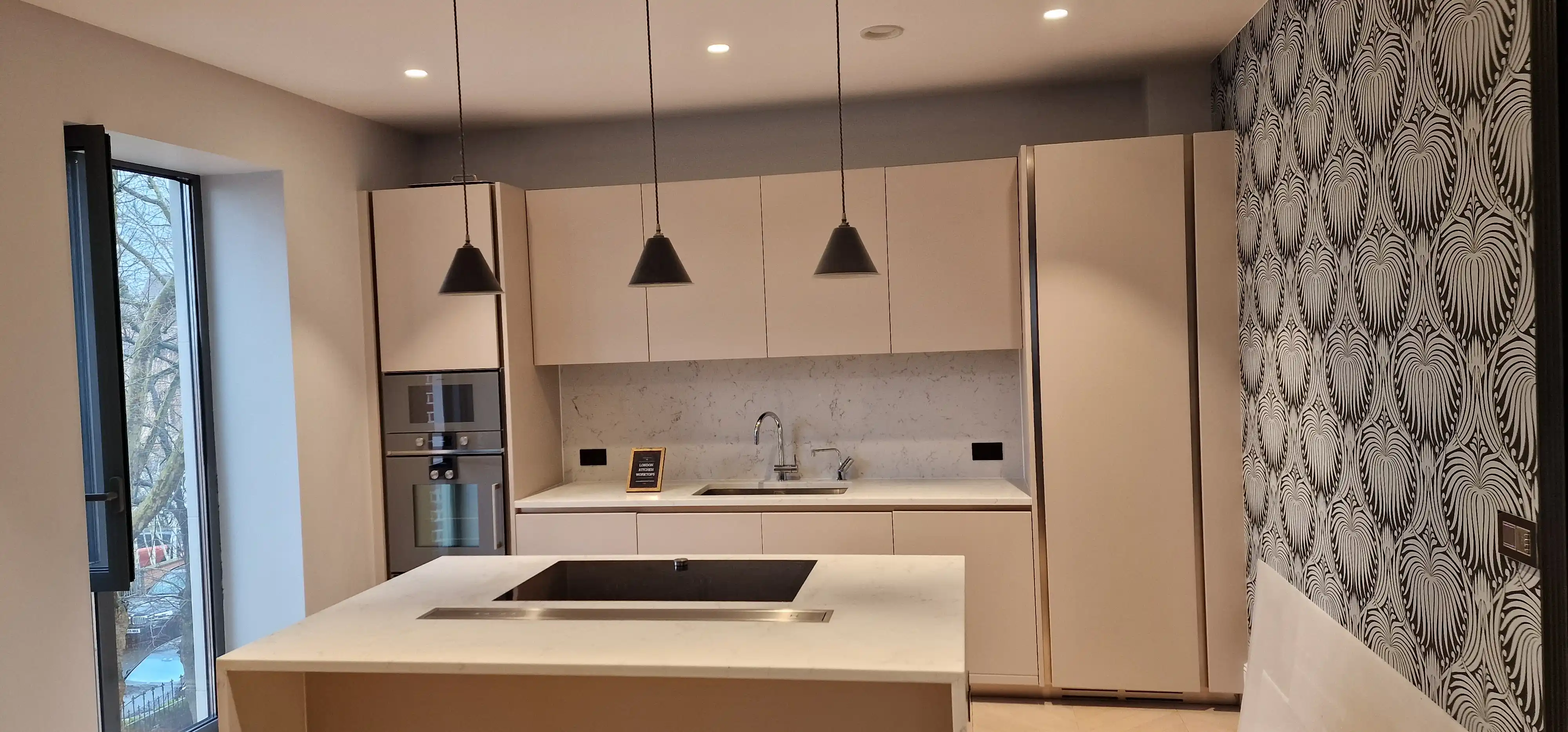 Carrara Style Quartz Barnes Carrara-style quartz worktops with soft veining for a Barnes period kitchen