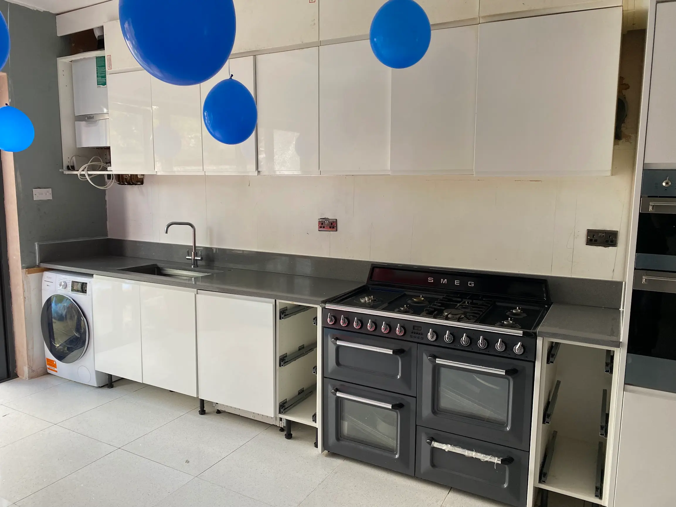 Grey Quartz Worktops Barnes Grey quartz worktops in a practical family kitchen layout