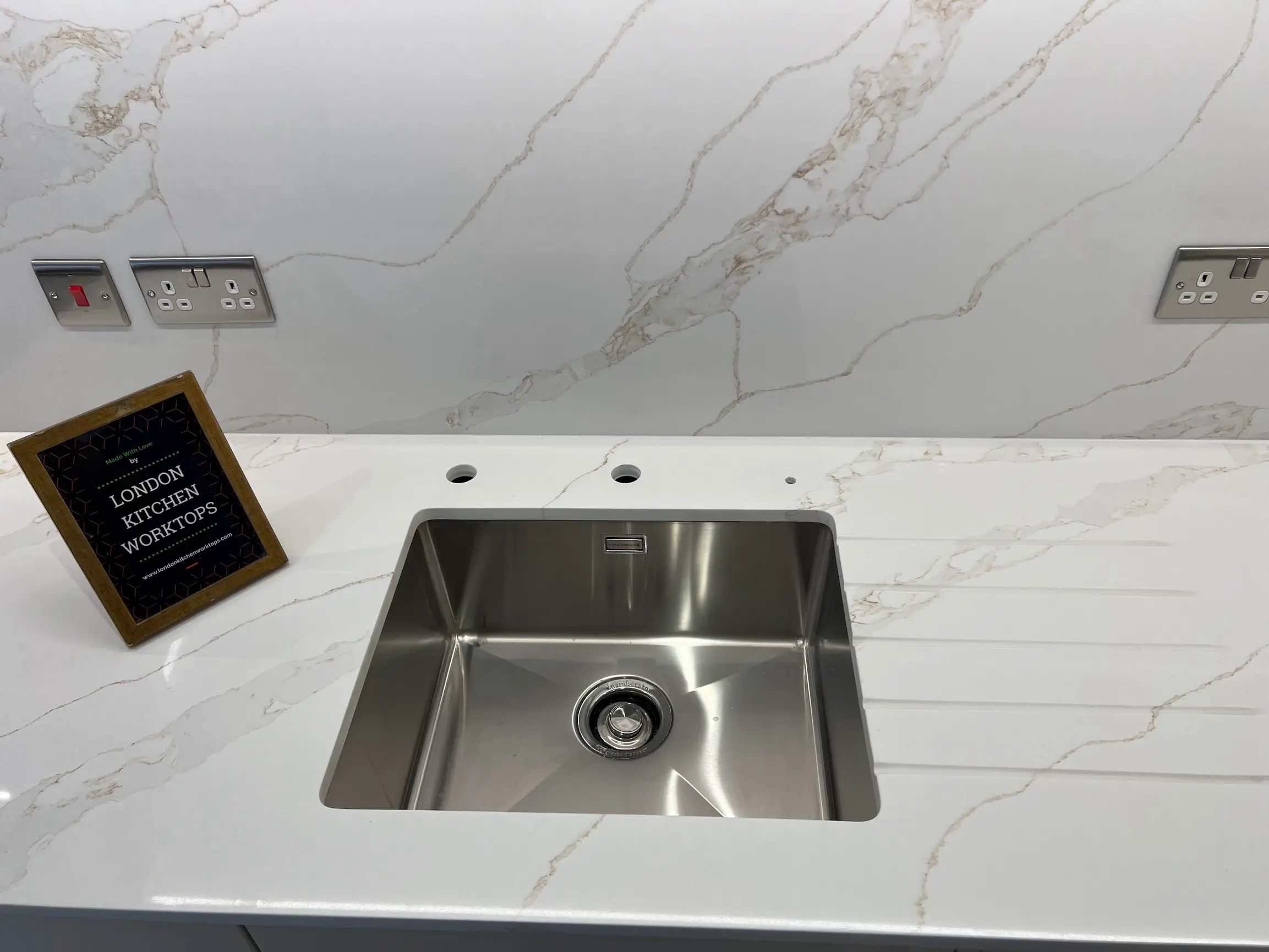 Quartz Fabrication Detail Barnes Quartz worktop with sink cut-out and drainer grooves ready for installation