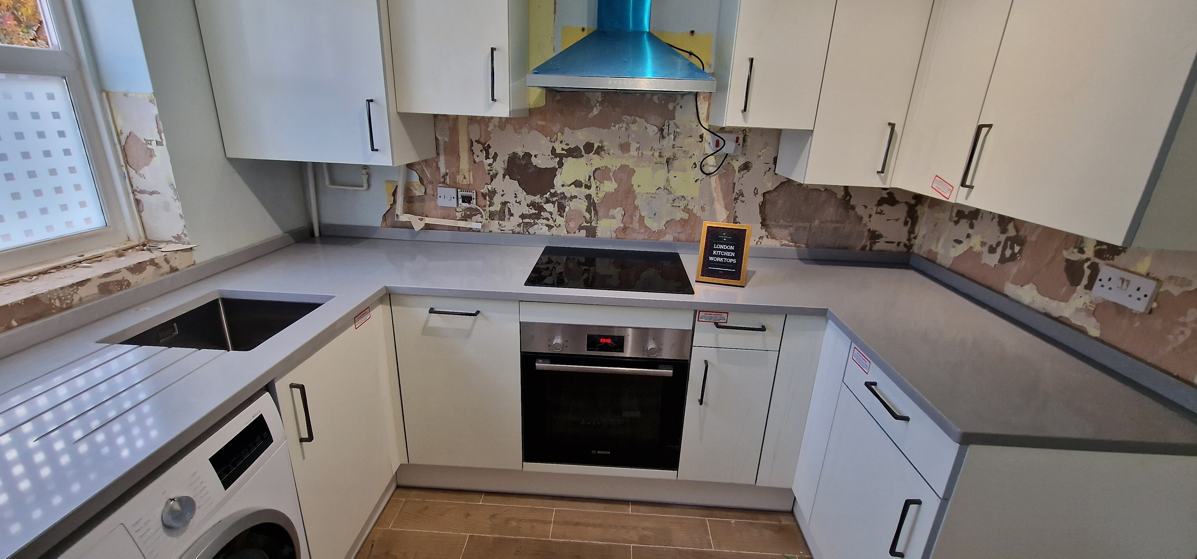 Grey Quartz Worktops Hanwell Grey quartz worktops fitted in a busy Hanwell family kitchen
