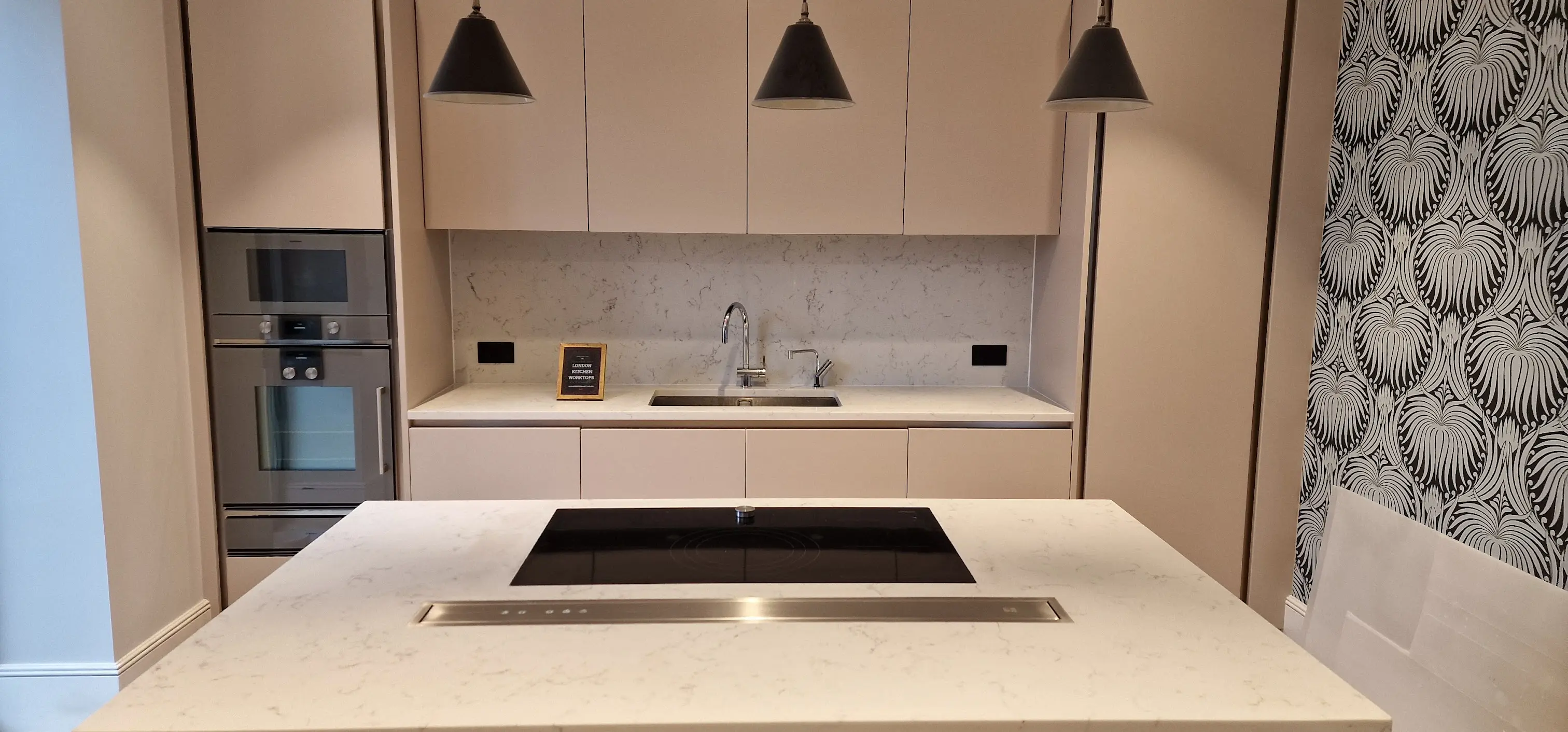 Carrara-style quartz Isleworth Carrara-style quartz worktops fitted in a traditional Isleworth kitchen