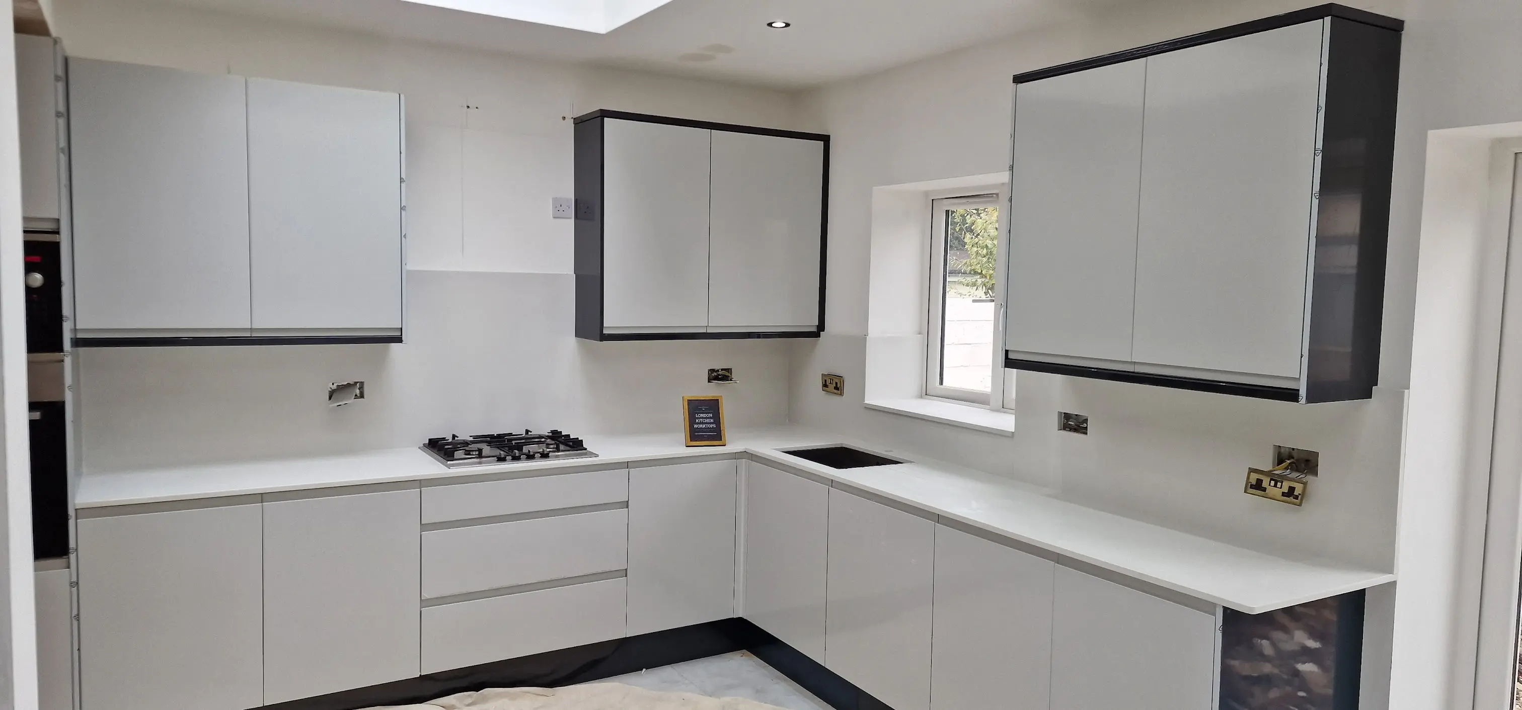 Finished quartz worktop installation in Pinner with sink cut-out and hob cut-out
