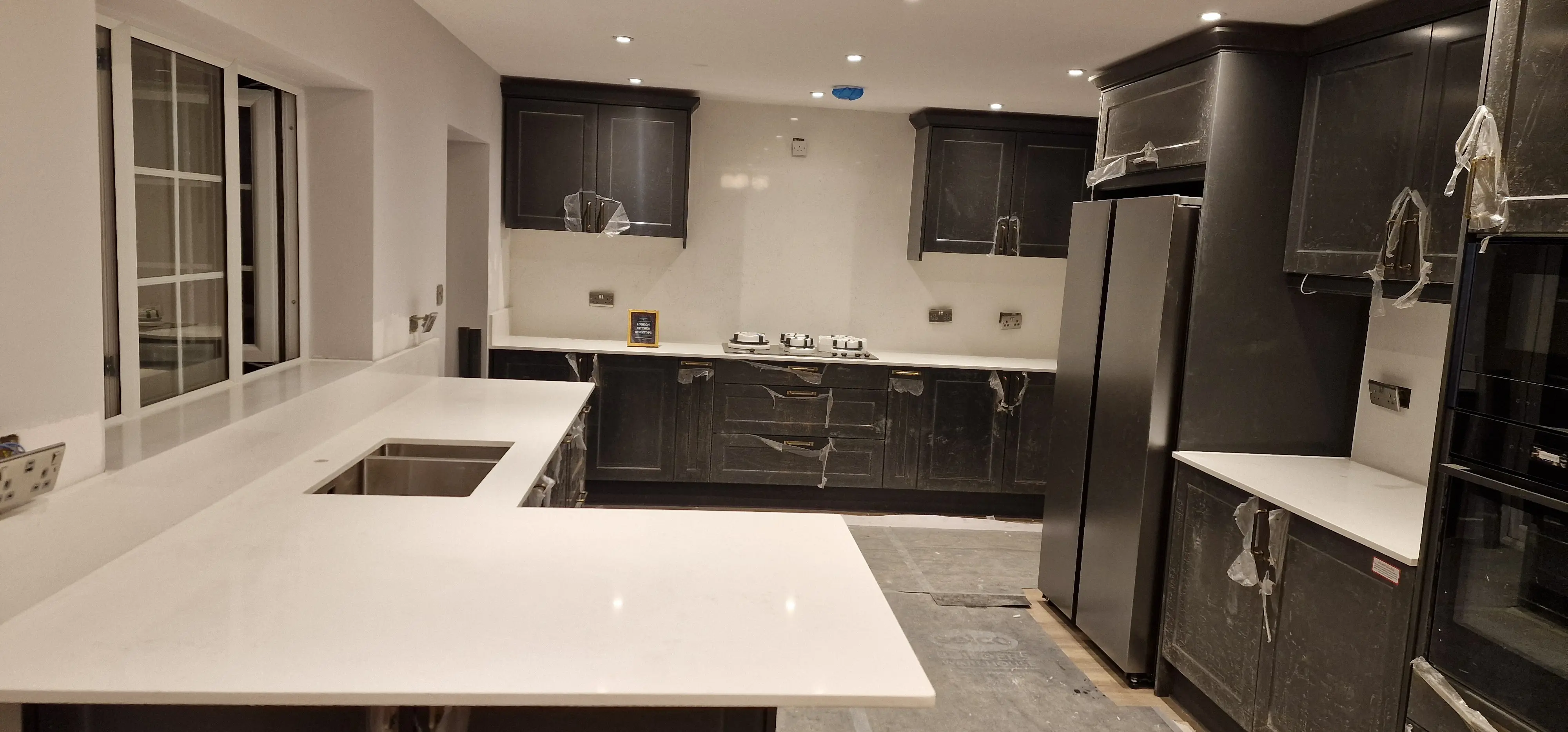 Quartz worktop with matching upstand and splashback in Uxbridge