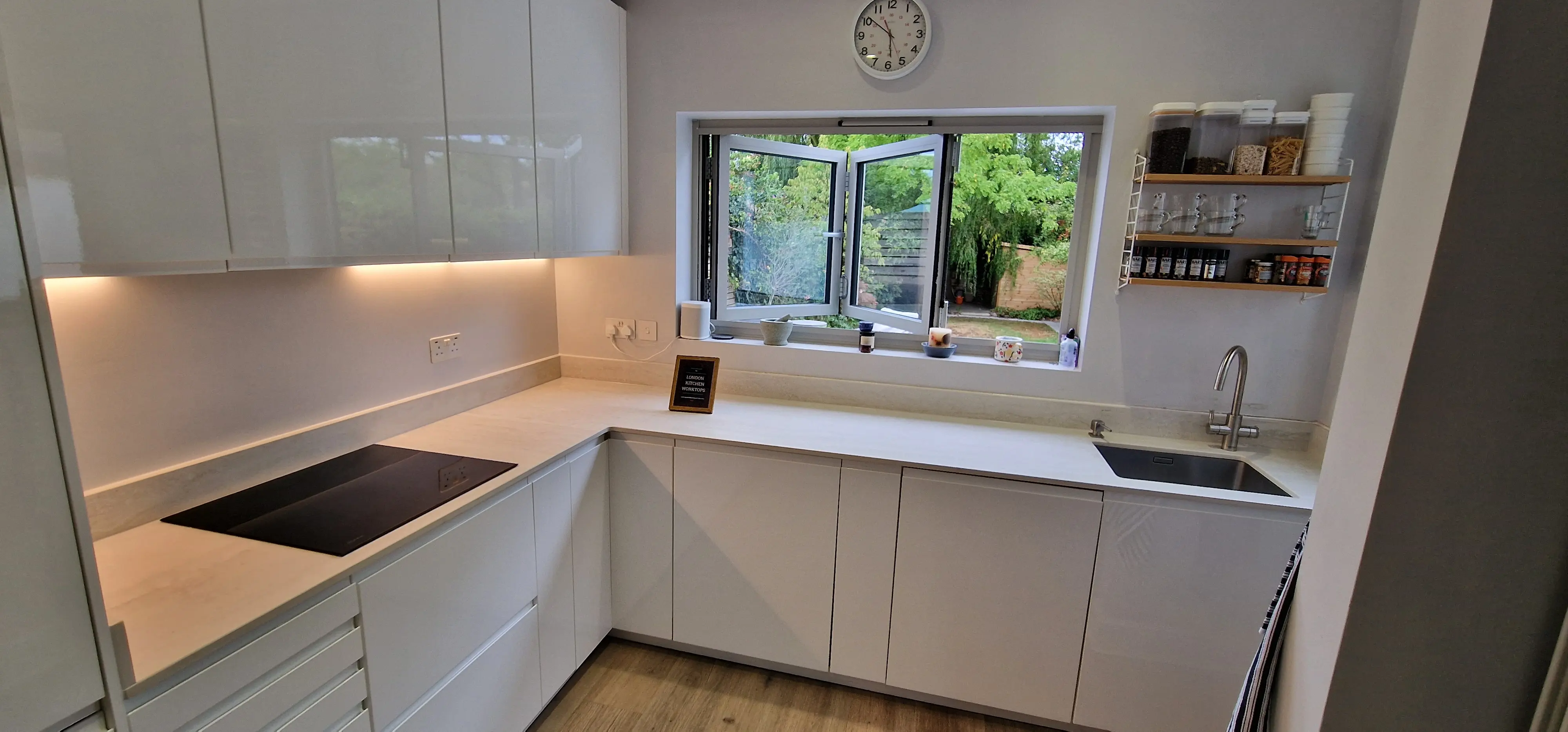 Replacement quartz worktops fitted with matching stone upstands