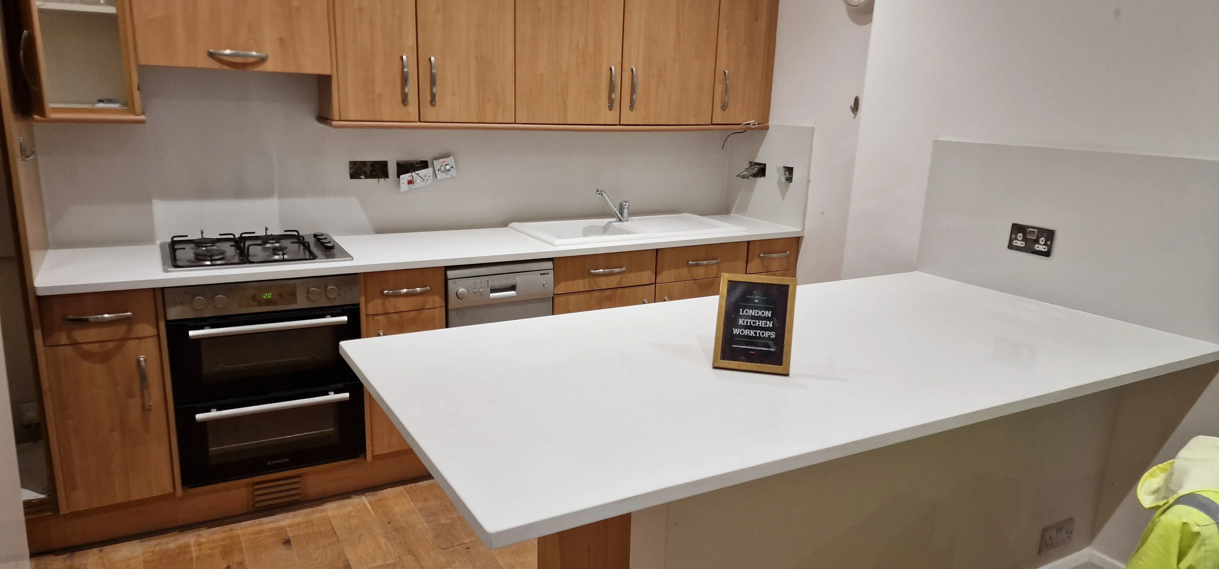 White Quartz Worktops Chiswick White quartz worktops in a bright Chiswick kitchen