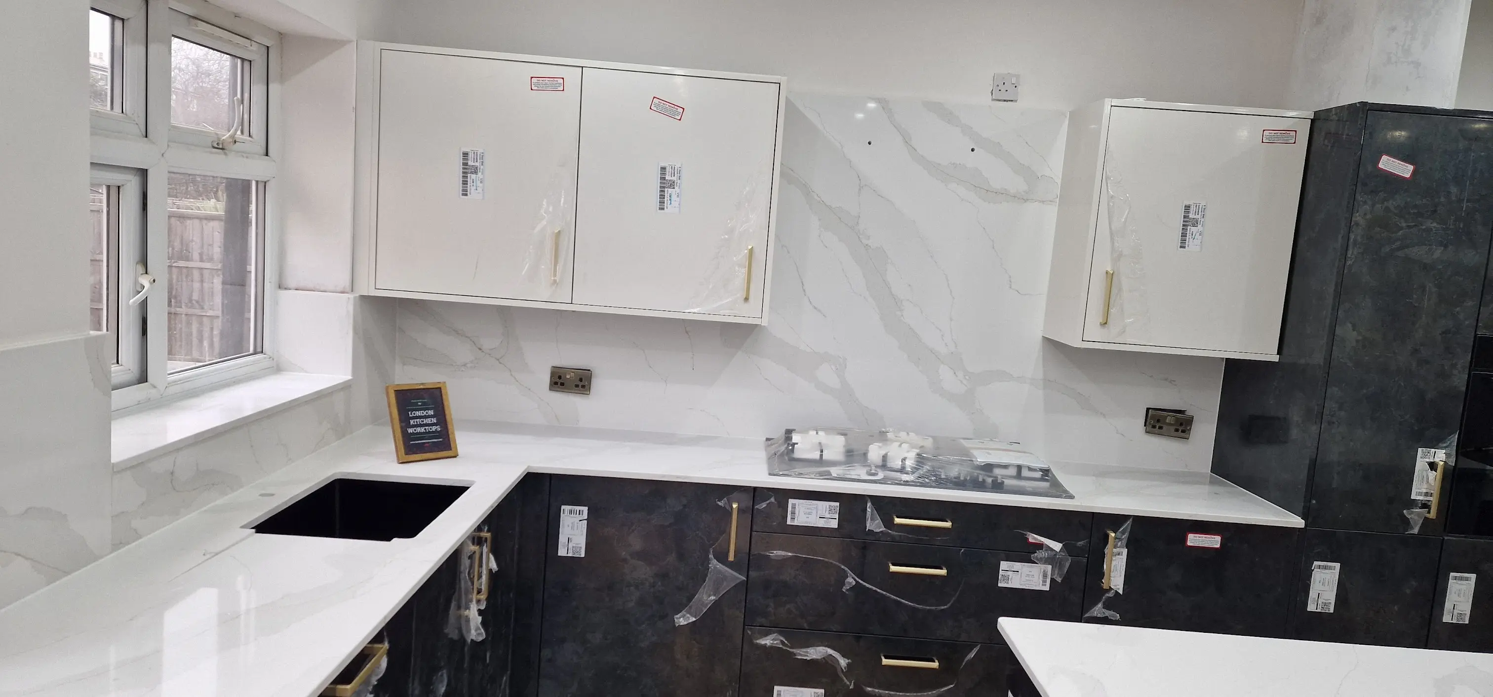 White quartz worktops fitted in a Victorian or Edwardian Teddington kitchen
